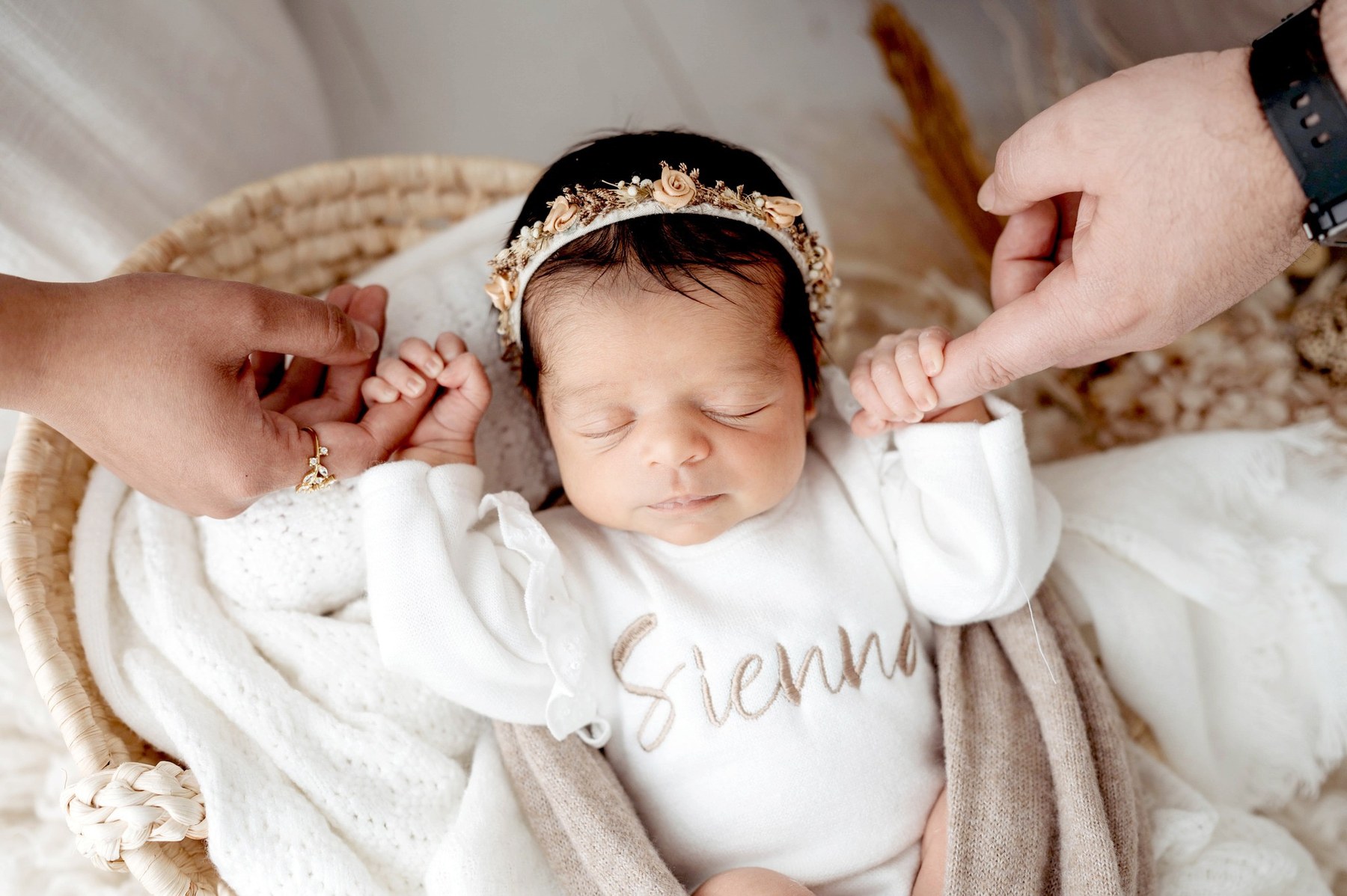 Newborn wearing a handmade personalised romper by Sweet Sews by Ann