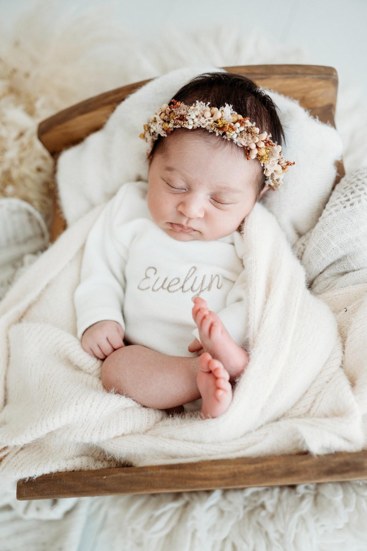 Newborn wearing a handmade personalised romper by Sweet Sews by Ann